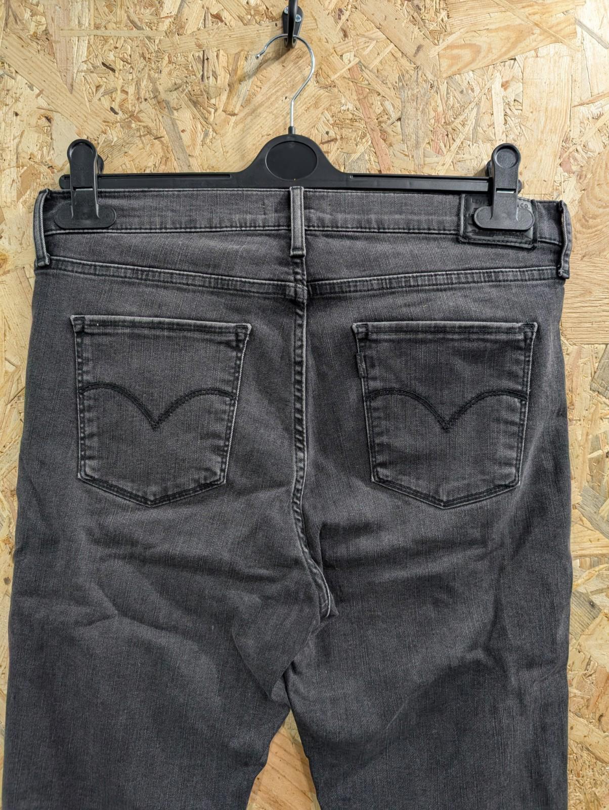 Levis 720 High Rise Super Skinny Jeans Size 8 W31 L30 Women Black Stretch Slim