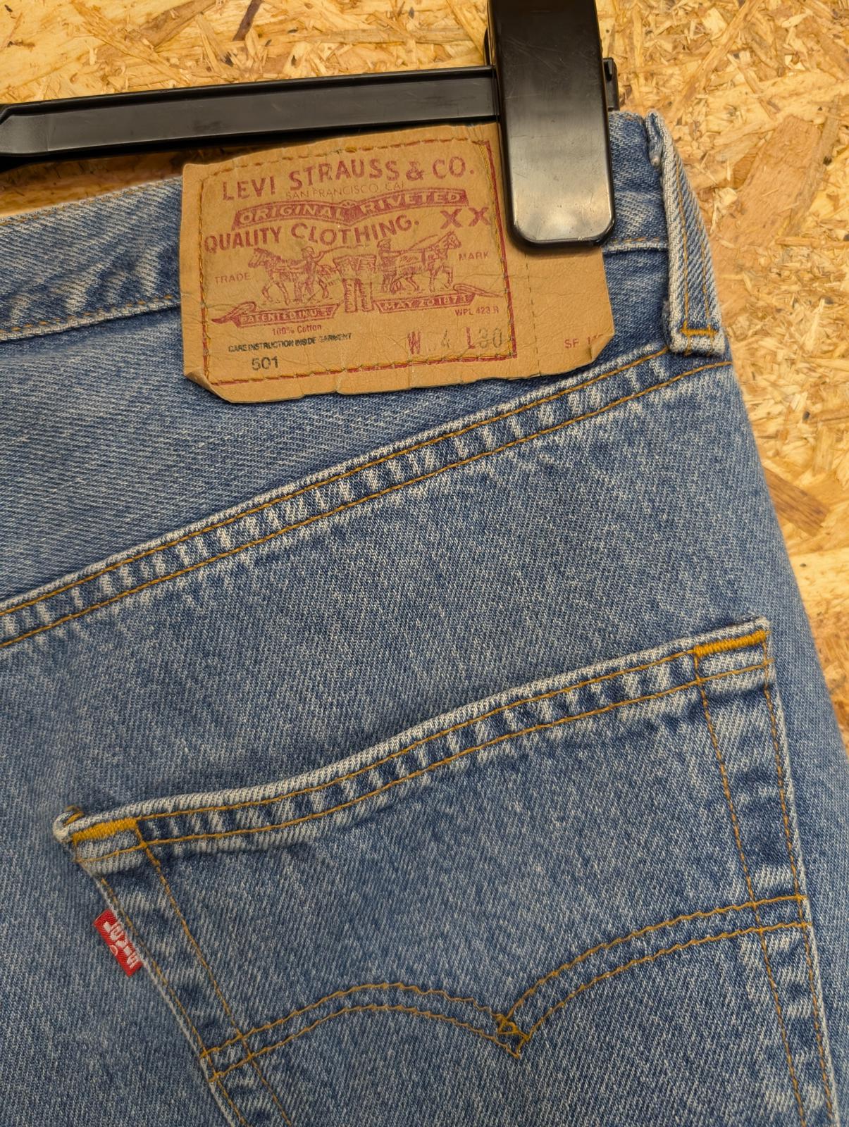 Levis 501 Jeans W34 L28 Made in USA Vintage 90s Mid Wash Blue Denim