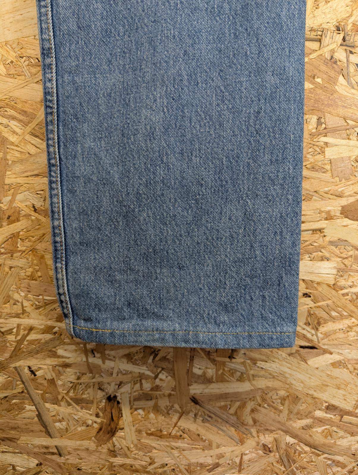 Levis 501 Jeans W34 L28 Made in USA Vintage 90s Mid Wash Blue Denim